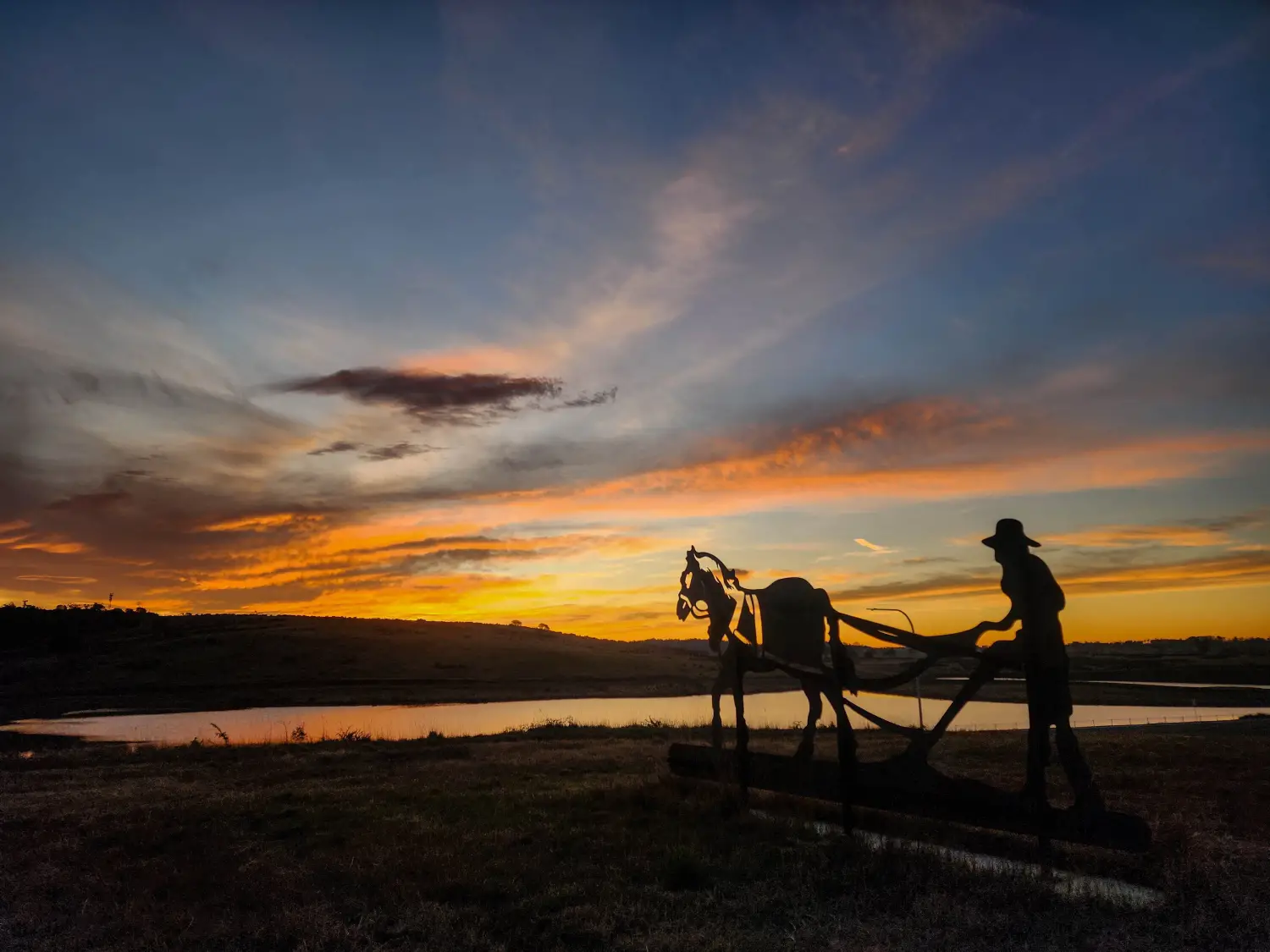 Carl Bolton Gibbed Hill w sihouetteinsunset